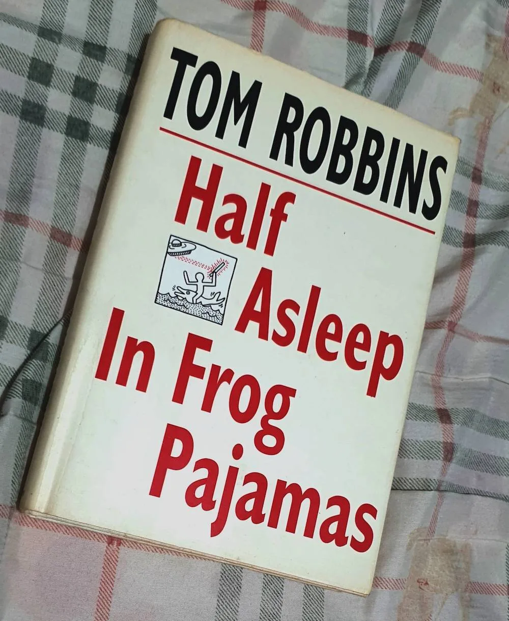 Half Asleep in Frog Pajamas by Tom Robbins